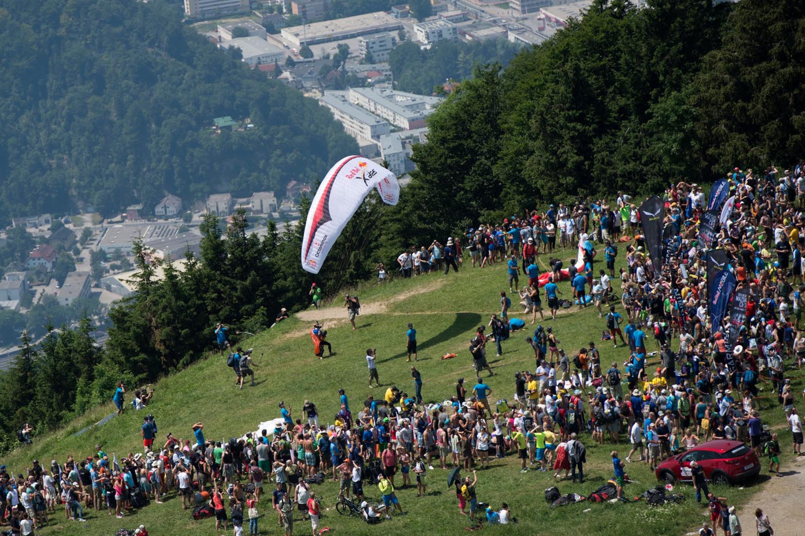 Competitors perform at the Gaisberg Mountain during the adventure race Red Bull X-Alps in Salzburg, on July 5th,  2015.